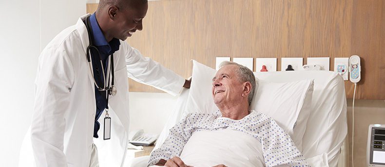 Doctor attends to patient