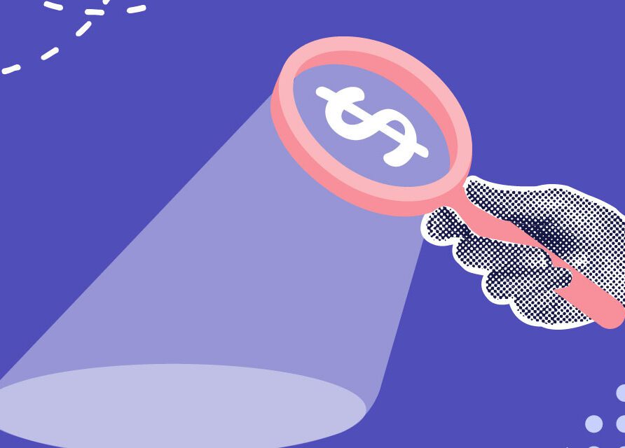 Hand holding magnifying glass with dollar sign