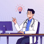 doctor at desk with computer